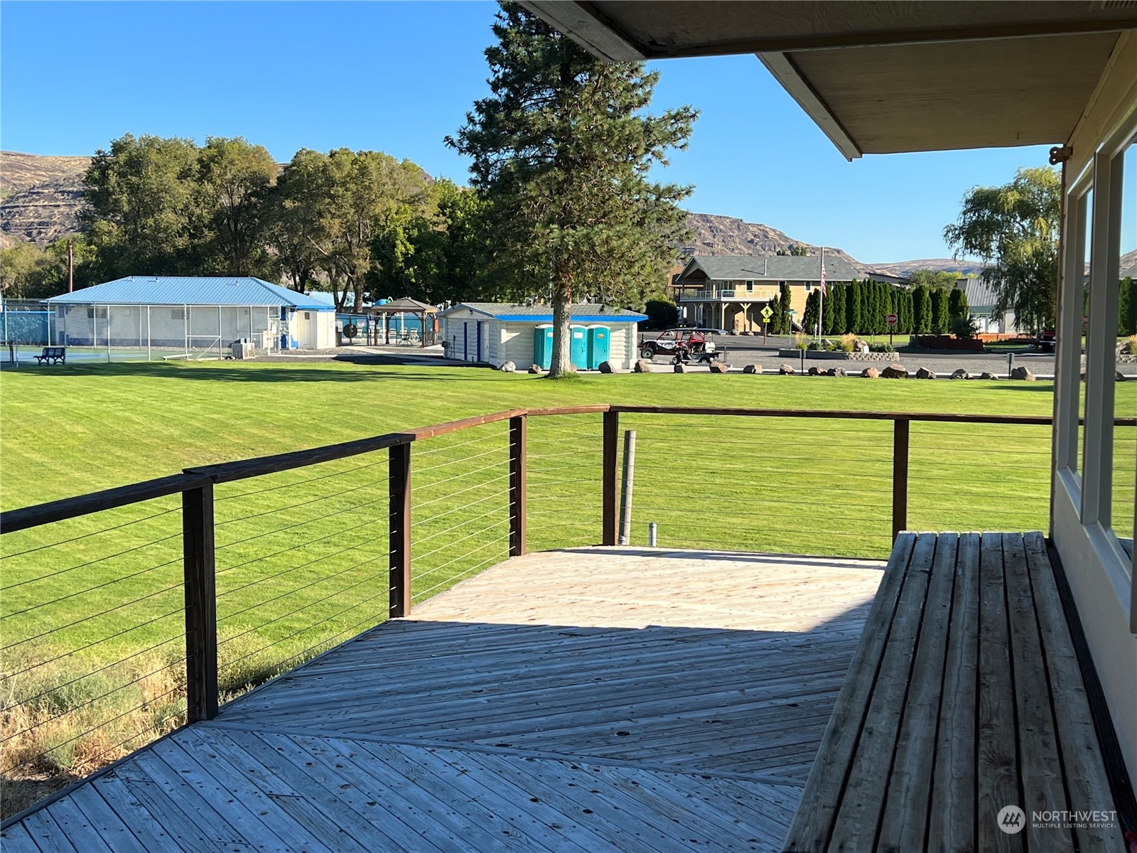 910 River Drive Quincy, WA 98848 - Photo 10 of 15 a view of swimming pool with a bench