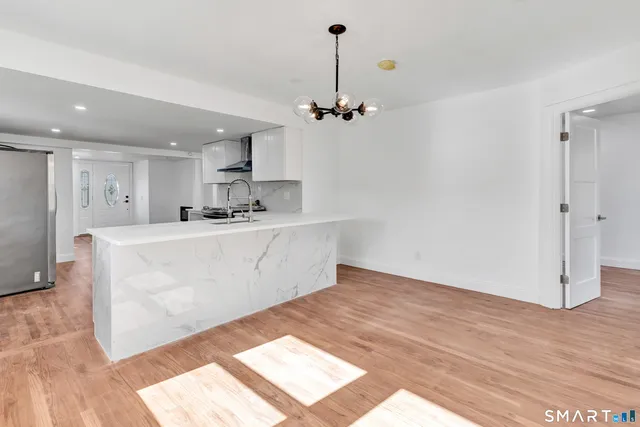 a view of a kitchen with marble kitchen and kitchen