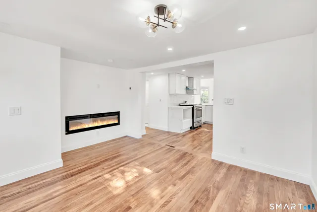 a view of a kitchen with a sink and dishwasher