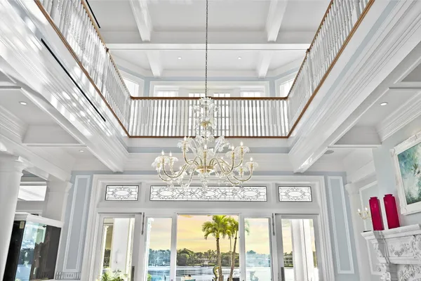 a living room with fireplace furniture and a wooden floor