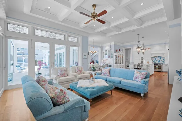 a view of a livingroom with furniture and a window