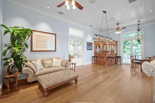 a large kitchen with granite countertop a sink and a stove