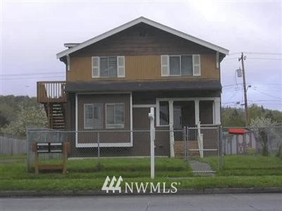 4841 Delridge Way Southwest Seattle, WA 98106 - Photo 1 of 1 a view of a house with a yard