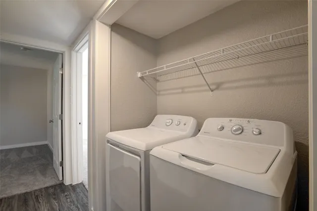 a utility room with dryer and washer