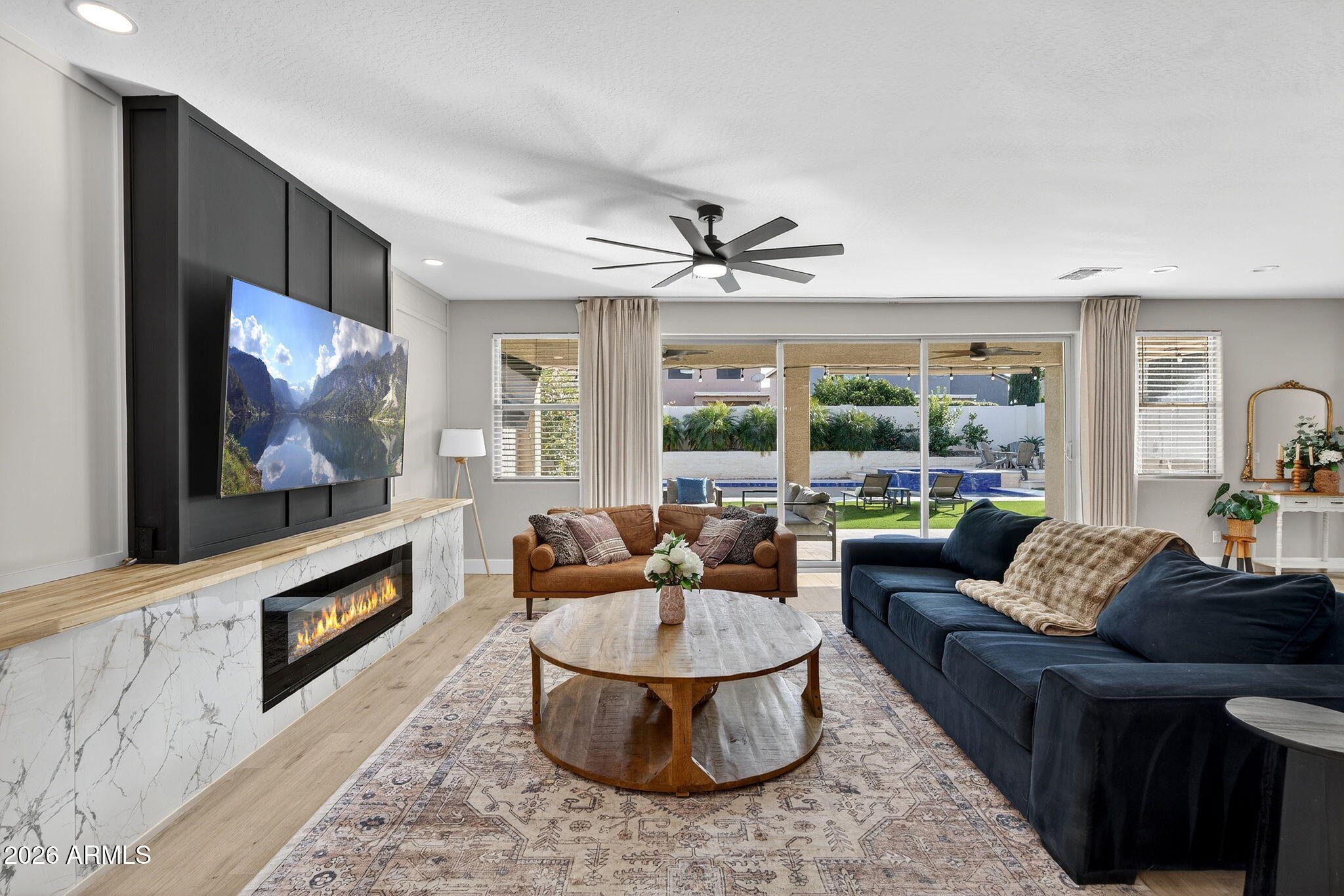 1663 West Gordon Street San Tan Valley, AZ 85144 - Photo 10 of 54 a living room with furniture and a flat screen tv