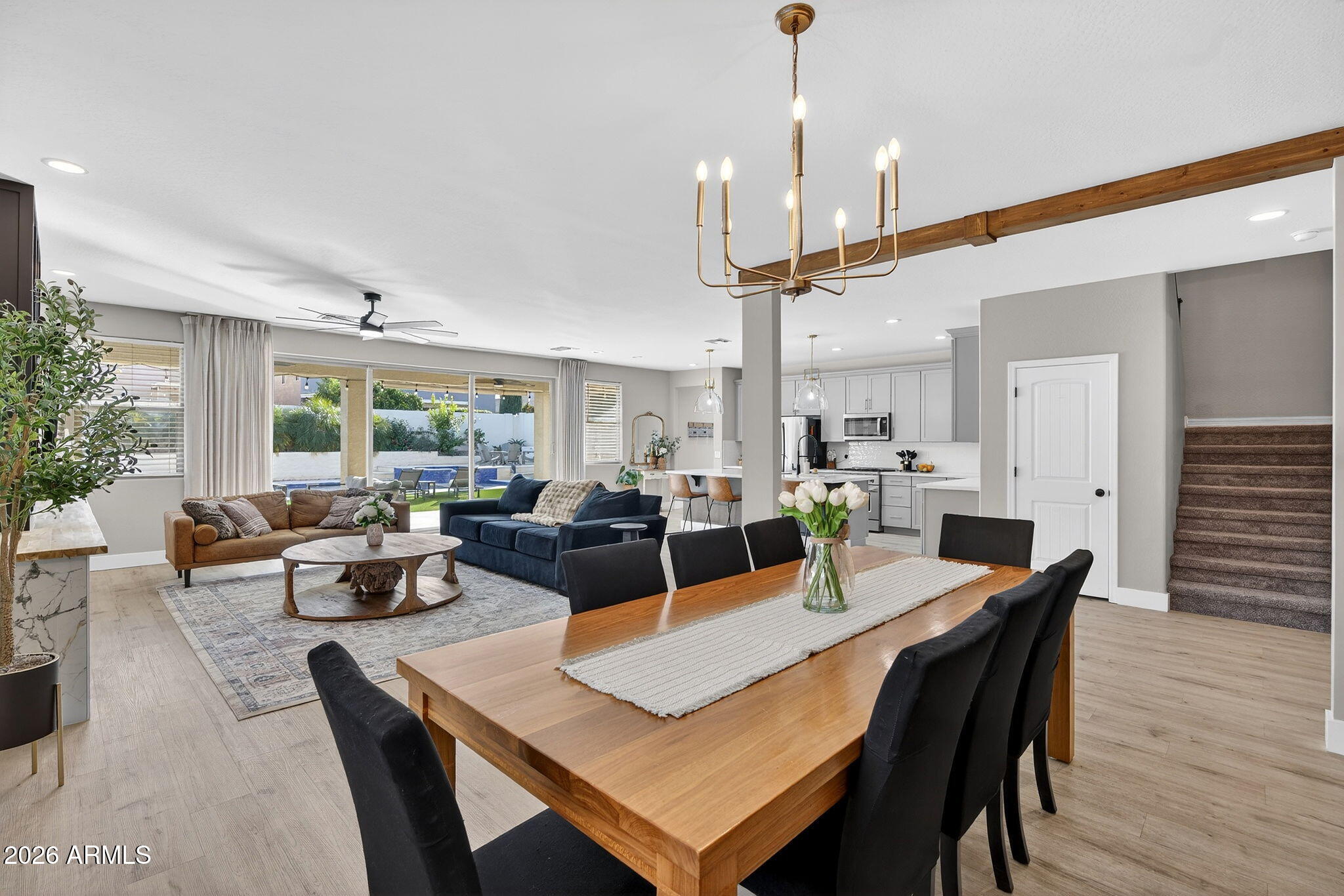 1663 West Gordon Street San Tan Valley, AZ 85144 - Photo 19 of 54 a view of a dining room and livingroom furniture and wooden floor