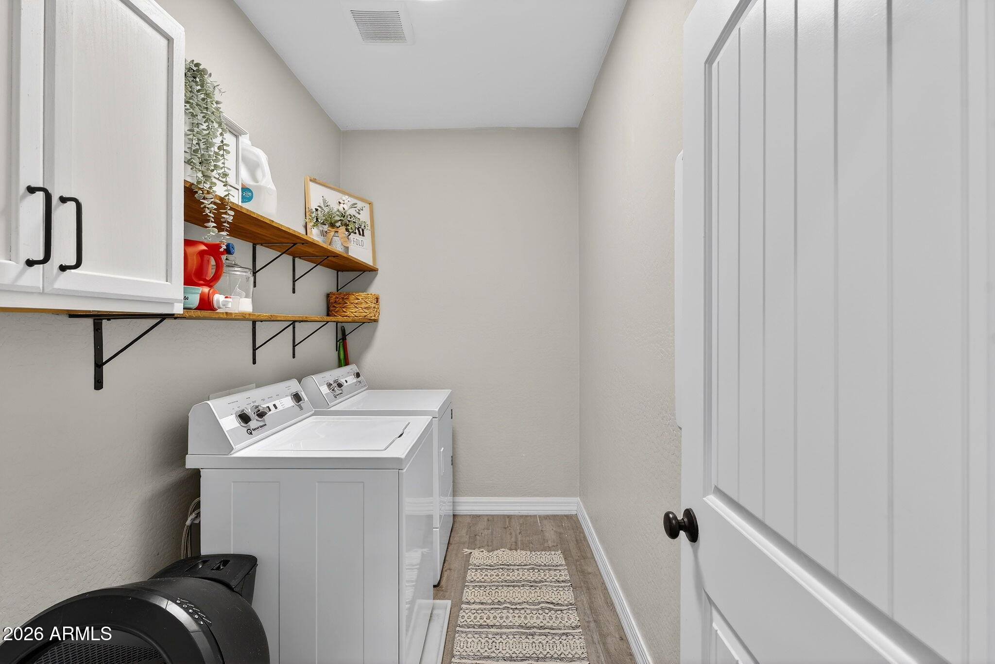 1663 West Gordon Street San Tan Valley, AZ 85144 - Photo 40 of 54 a utility room with dryer and washer