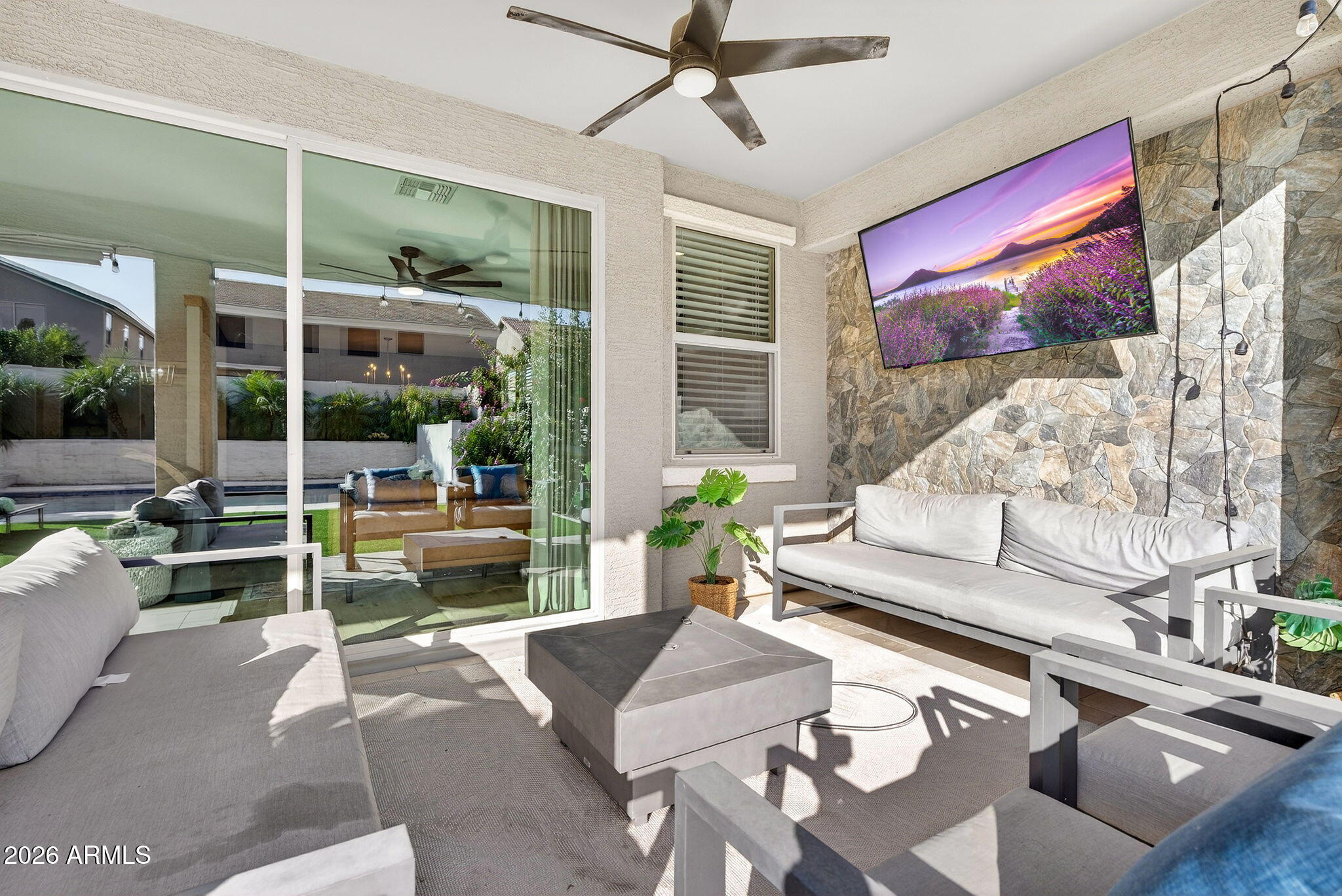 1663 West Gordon Street San Tan Valley, AZ 85144 - Photo 42 of 54 a living room with furniture and a large window