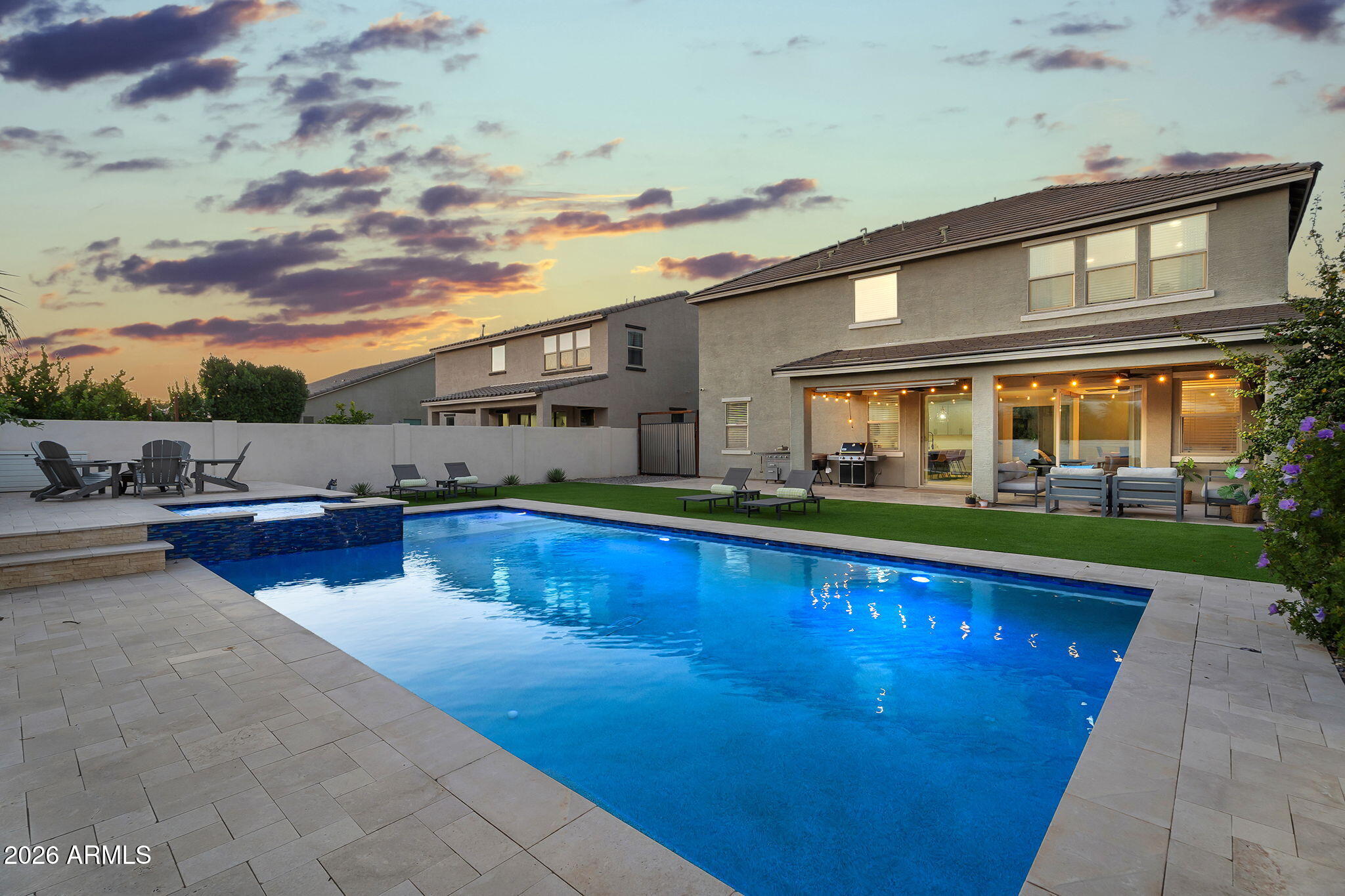 1663 West Gordon Street San Tan Valley, AZ 85144 - Photo 45 of 54 a view of swimming pool with outdoor seating and a garden