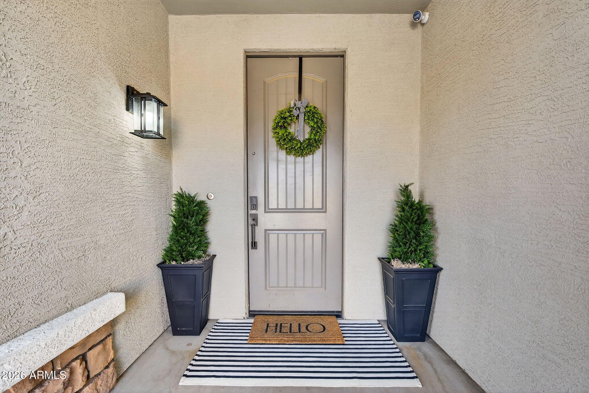 1663 West Gordon Street San Tan Valley, AZ 85144 - Photo 3 of 54 a view of a porch with a potted plant