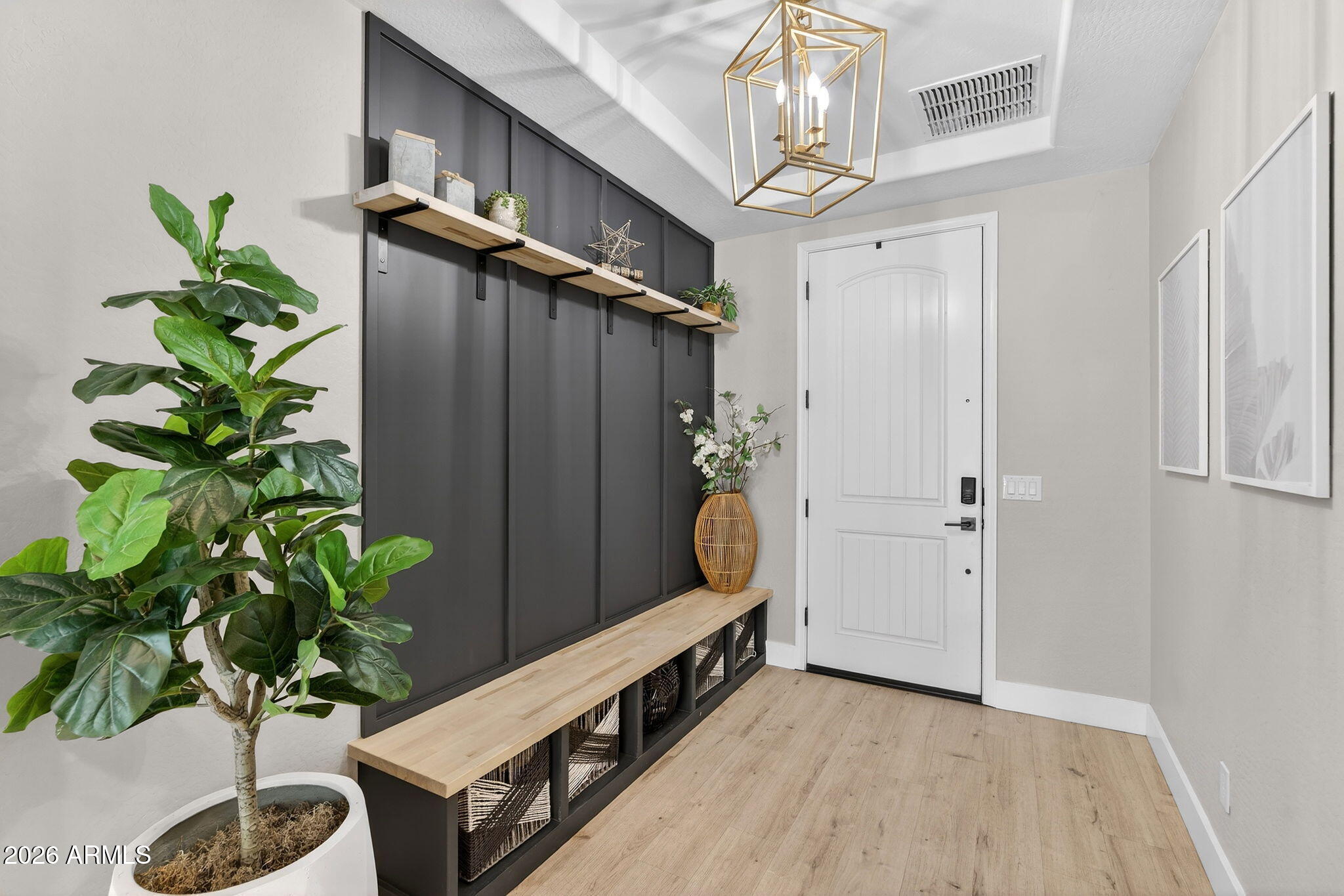1663 West Gordon Street San Tan Valley, AZ 85144 - Photo 4 of 54 a view of entryway with wooden floor