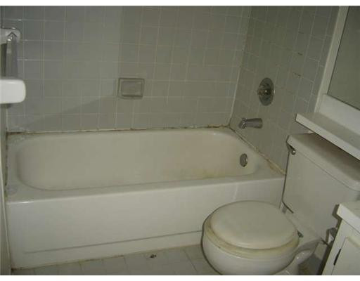 560 South Park Road, Unit 117 Hollywood, FL 33021 - Photo 6 of 8 a bathroom with a sink and a toilet