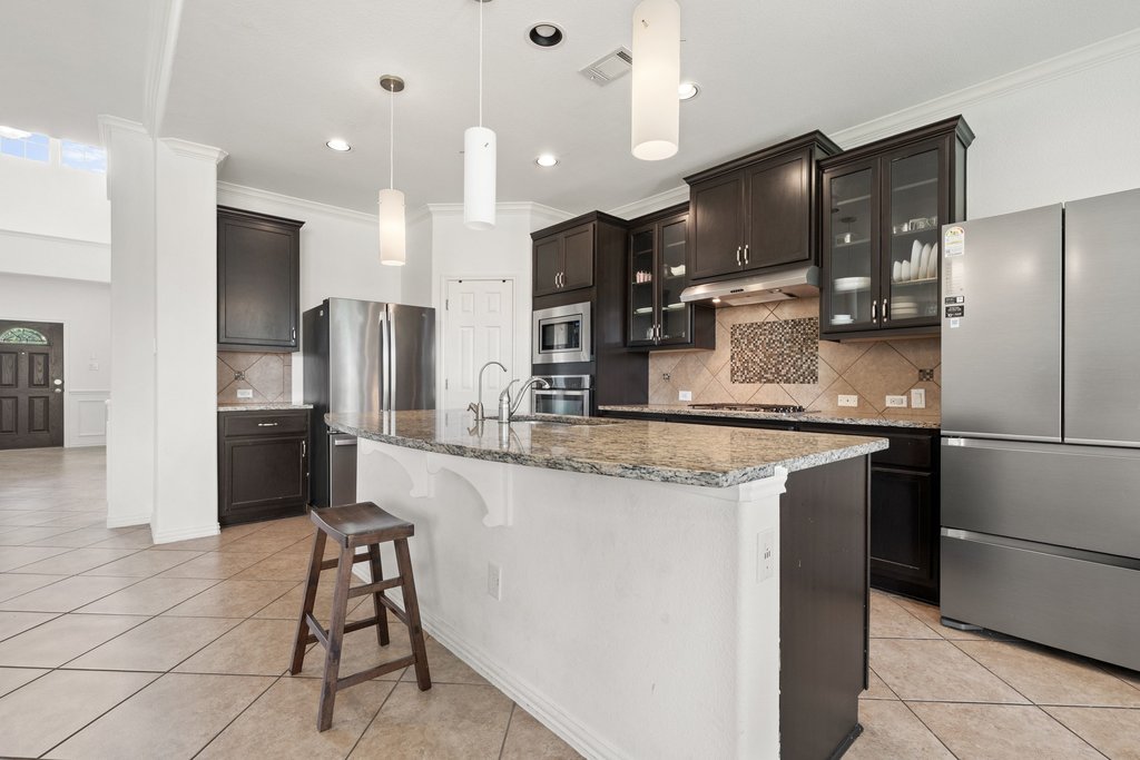 3013 Agave Loop Round Rock, TX 78681 - Photo 12 of 37 Modern Glass door cabinets and Built in Appliances