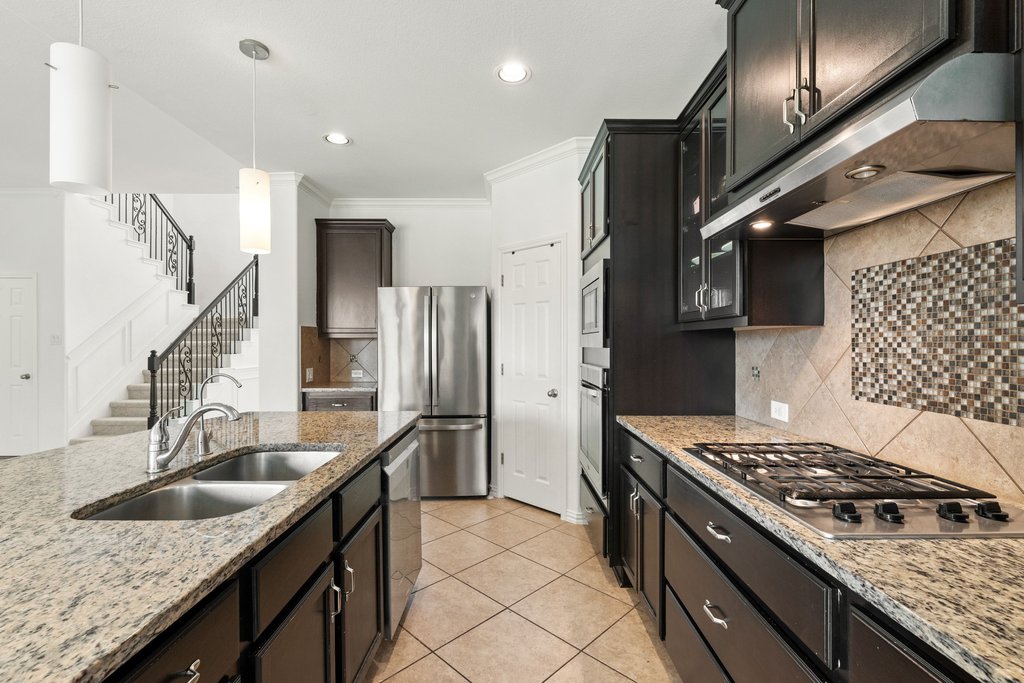 3013 Agave Loop Round Rock, TX 78681 - Photo 13 of 37 Drop in Cooktop with Vent Hood