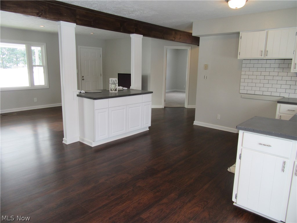 6 Mishler Road Hartville, OH 44632 - Photo 3 of 35 Looking from the dining area into the kitchen and living room