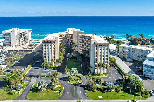 a view of a chairs and table in patio