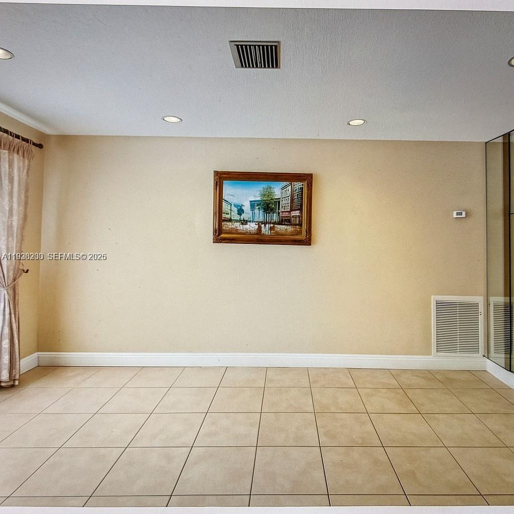 6385 Southwest 25th Street Miami, FL 33155 - Photo 5 of 26 a view of an empty room