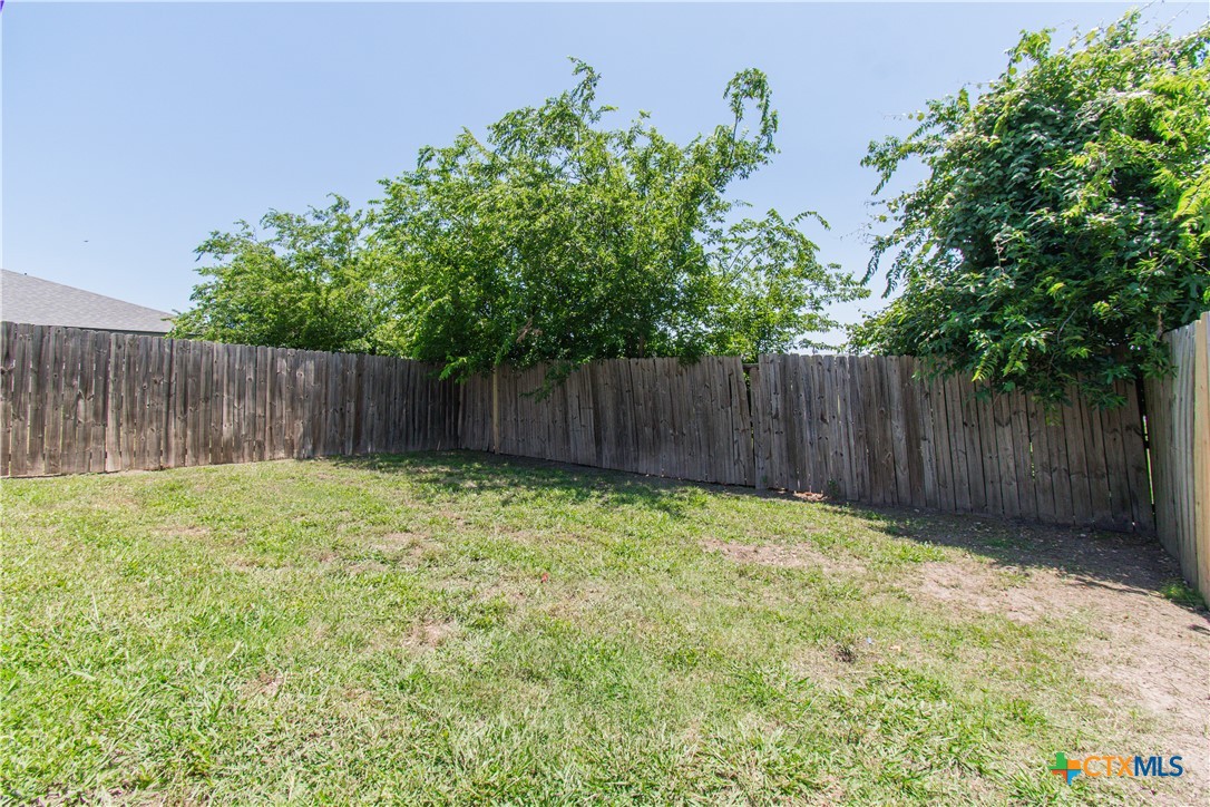 3104 Baldwin Loop, Unit B Killeen, TX 76549 - Photo 19 of 19 a view of outdoor space with wooden fence
