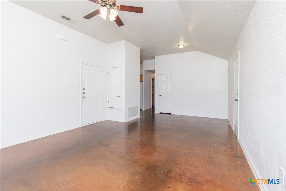 3104 Baldwin Loop, Unit B Killeen, TX 76549 - Photo 4 of 19 a view of an empty room with a ceiling fan
