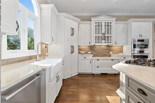 a bedroom with furniture and window