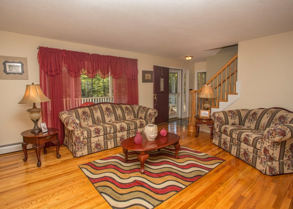 138 Sarah Sherman Road Rochester, MA 02770 - Photo 17 of 30 a living room with furniture and a large window