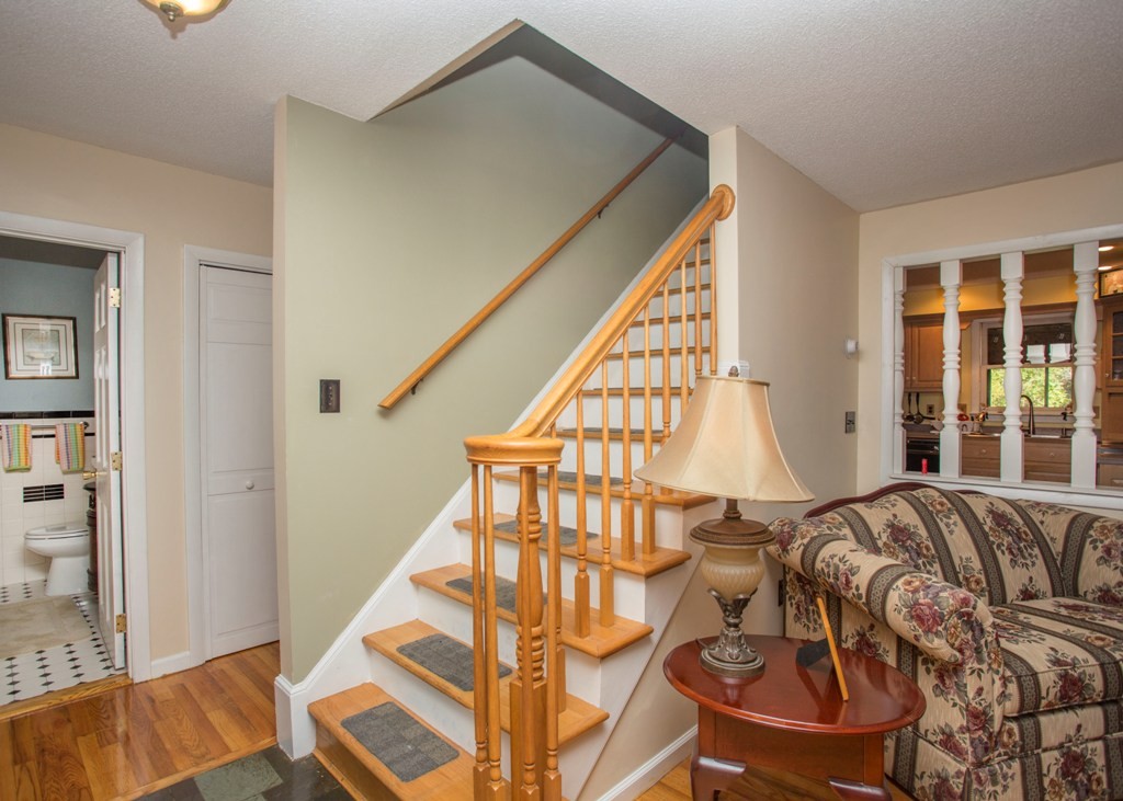 138 Sarah Sherman Road Rochester, MA 02770 - Photo 25 of 30 a bed sitting in a bedroom next to a window