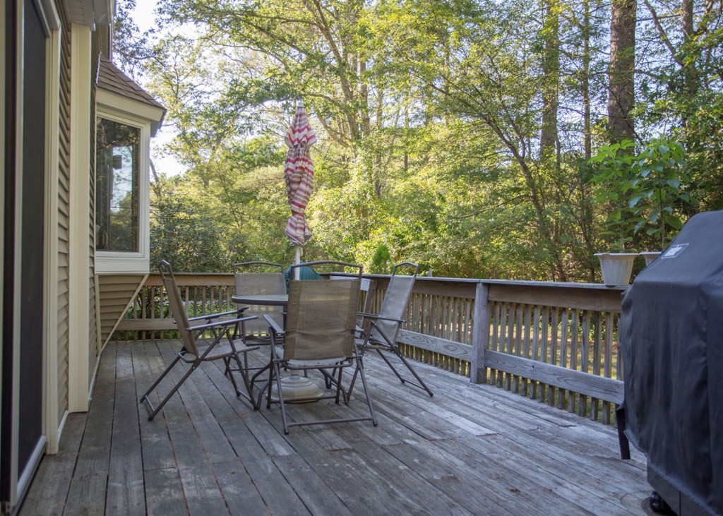 138 Sarah Sherman Road Rochester, MA 02770 - Photo 7 of 30 a view of a chairs and table on the wooden floor