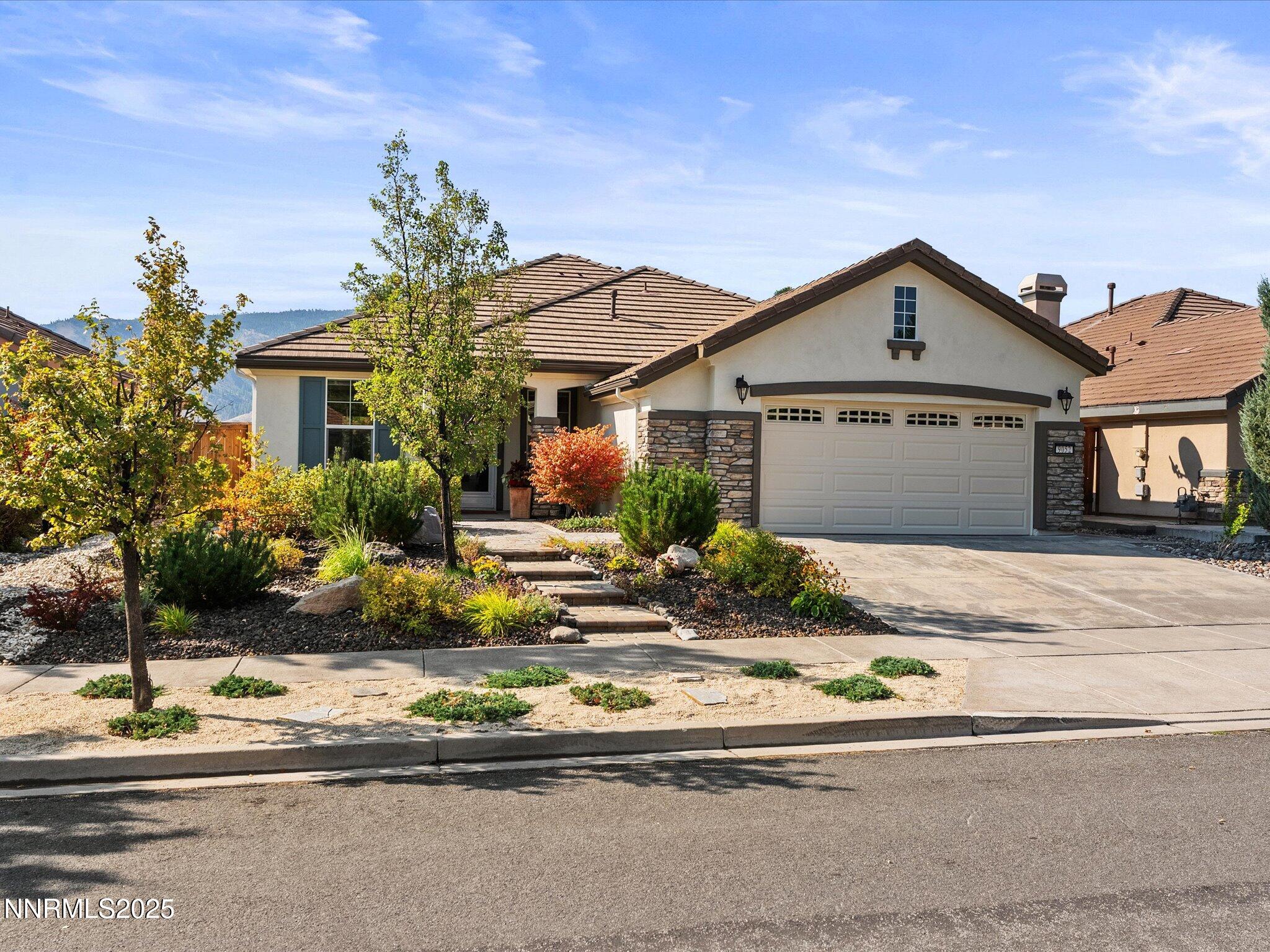 front view of a house with a small yard
