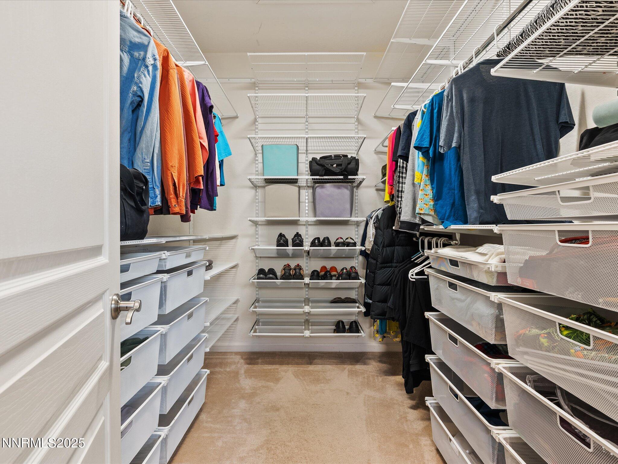 9052 Cabin Creek Trail Reno, NV 89523 - Photo 18 of 34 a view of walk in closet with clothes and shoes