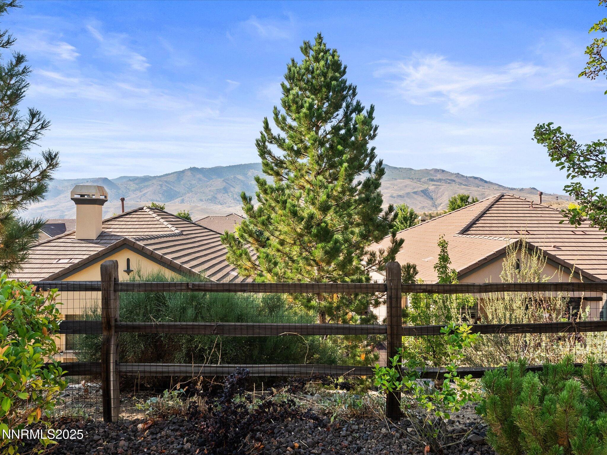 9052 Cabin Creek Trail Reno, NV 89523 - Photo 26 of 34 a view of house with yard and swimming pool