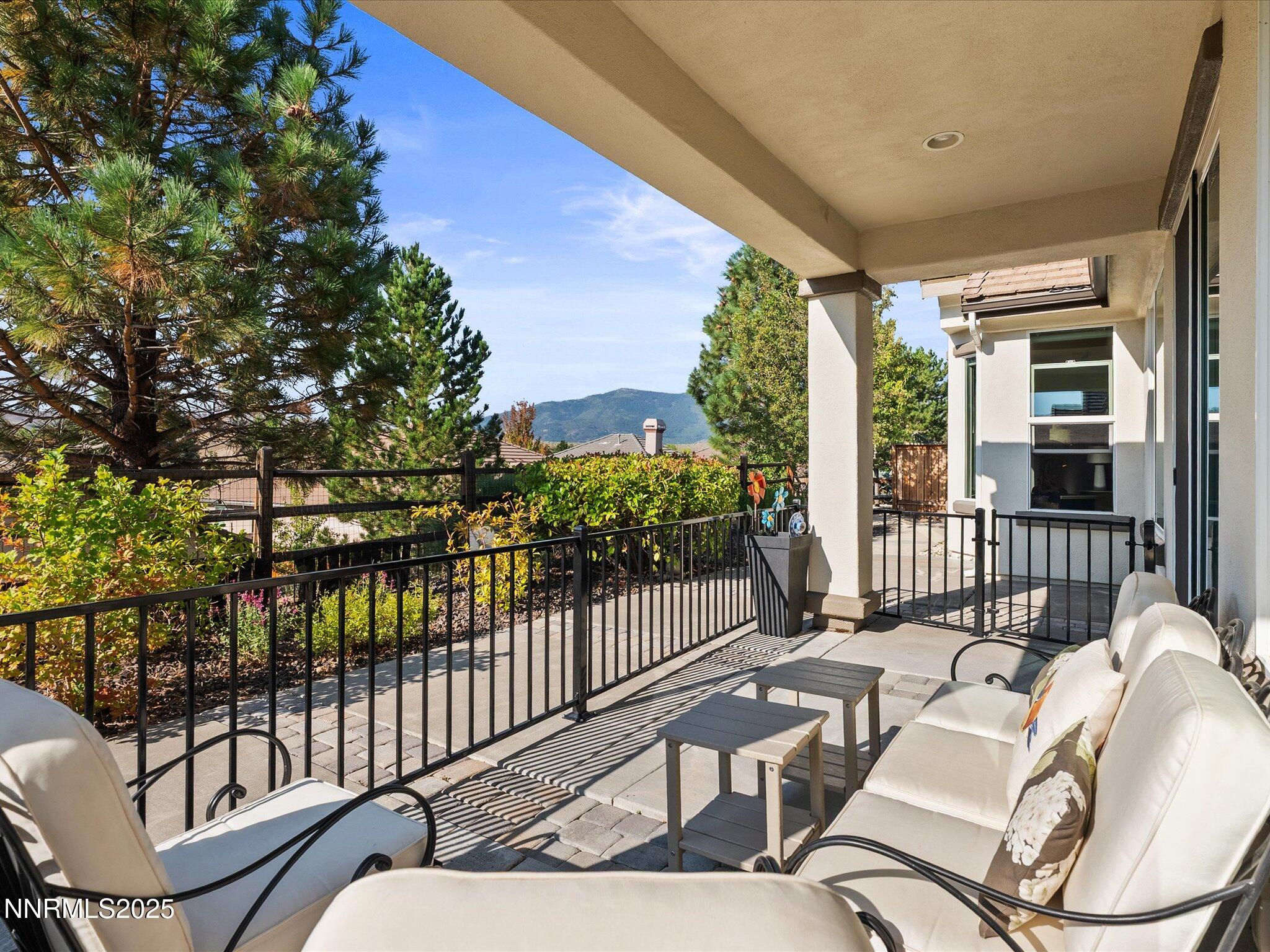 9052 Cabin Creek Trail Reno, NV 89523 - Photo 3 of 34 a view of a chairs and table in the balcony