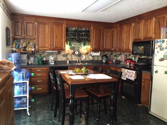 176 Lamb Road Rockvale, TN 37153 - Photo 5 of 19 Kitchen has Walnut Cabinets