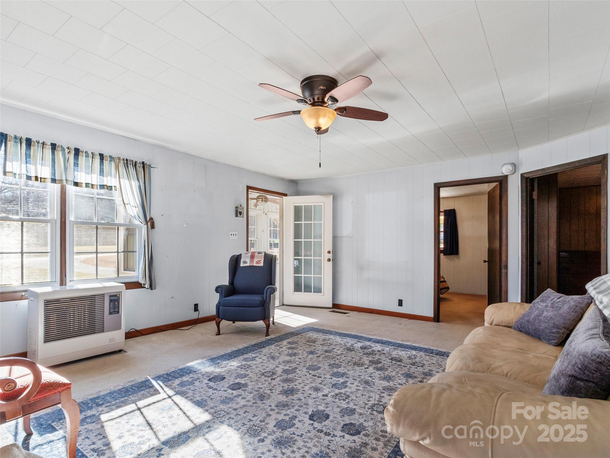 1879 White Oak Road Burnsville, NC 28714 - Photo 11 of 37 a living room with furniture and a window