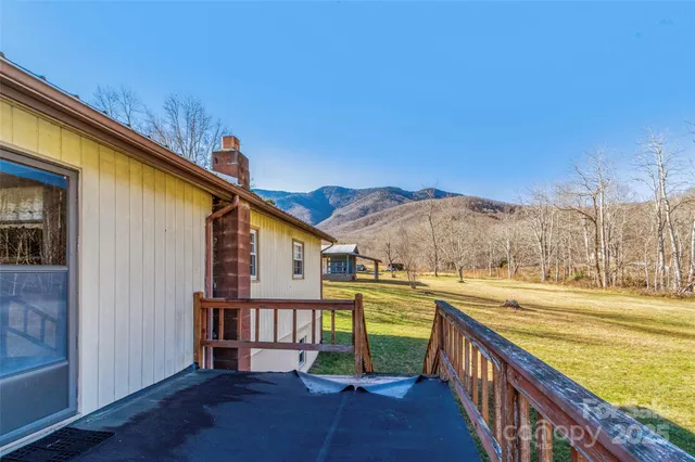 a view of swimming pool with seating space