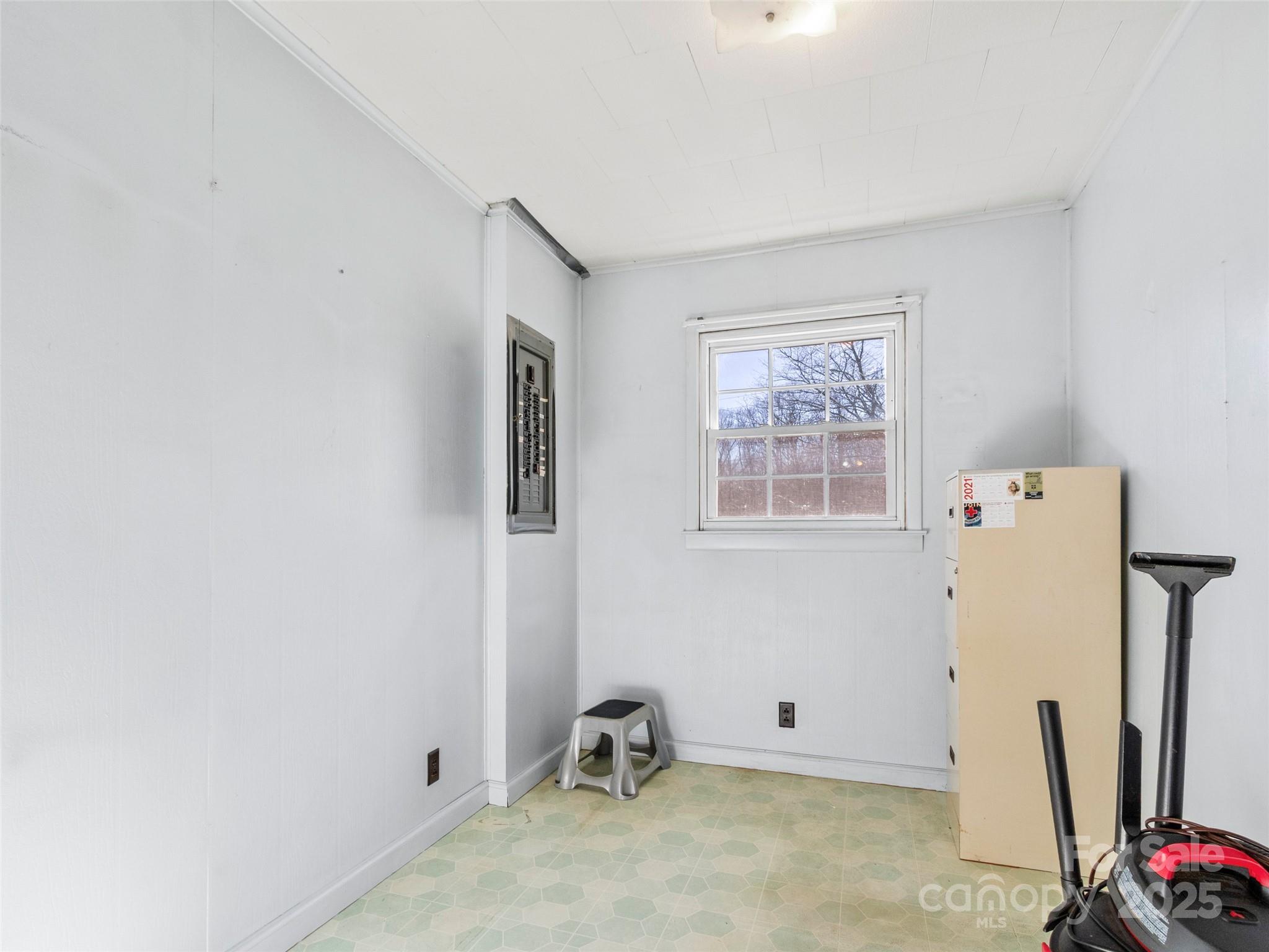 1879 White Oak Road Burnsville, NC 28714 - Photo 18 of 37 a room with storage and utility