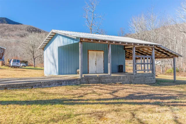 a view of a house with a swimming pool