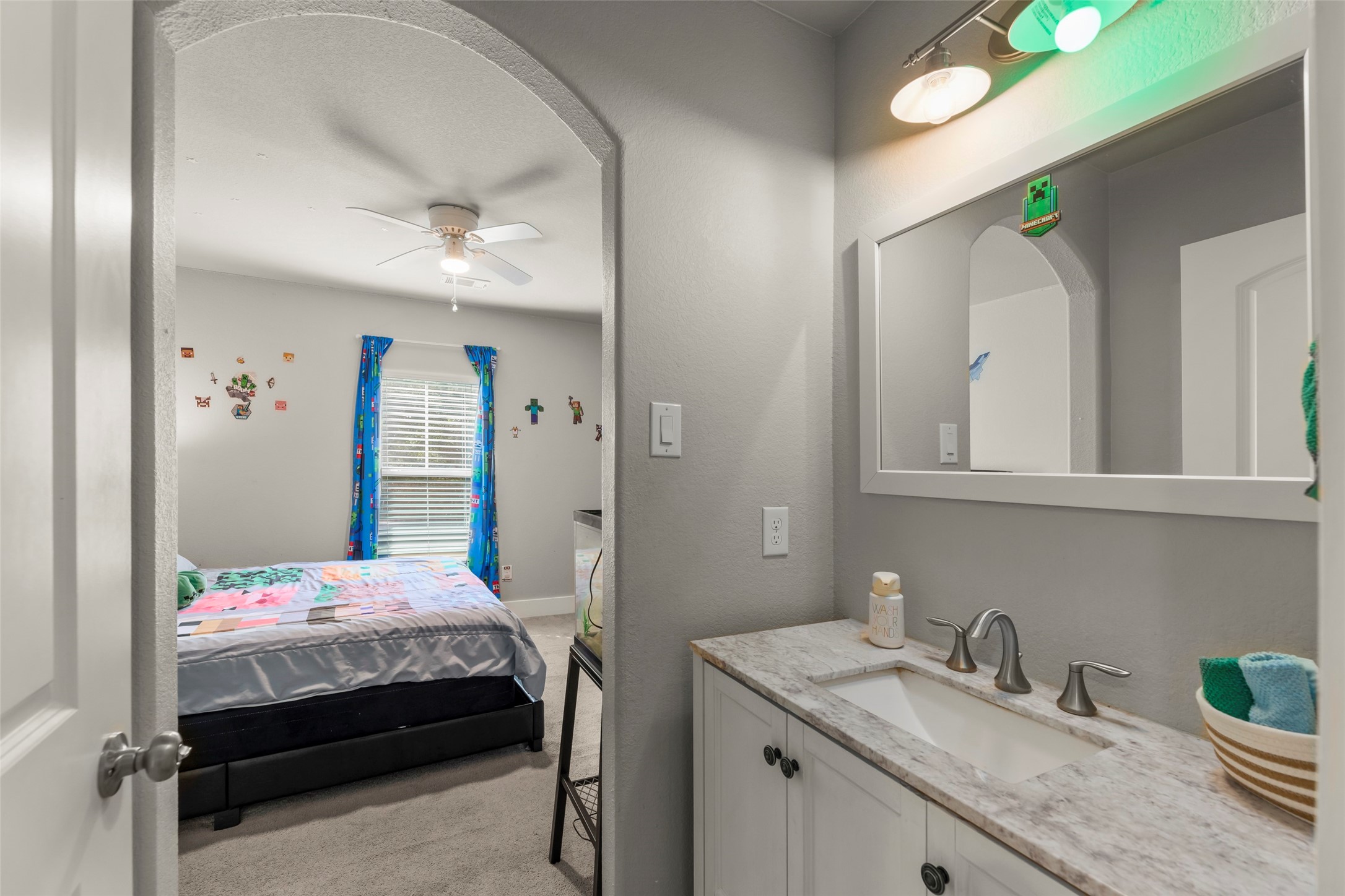 23918 Overcup Drive Spring, TX 77389 - Photo 19 of 37 a bedroom with a bed and cabinets