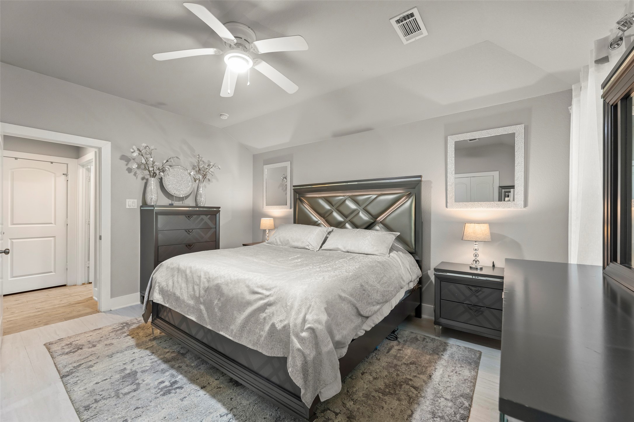 23918 Overcup Drive Spring, TX 77389 - Photo 24 of 37 a bedroom with a bed and a lamp