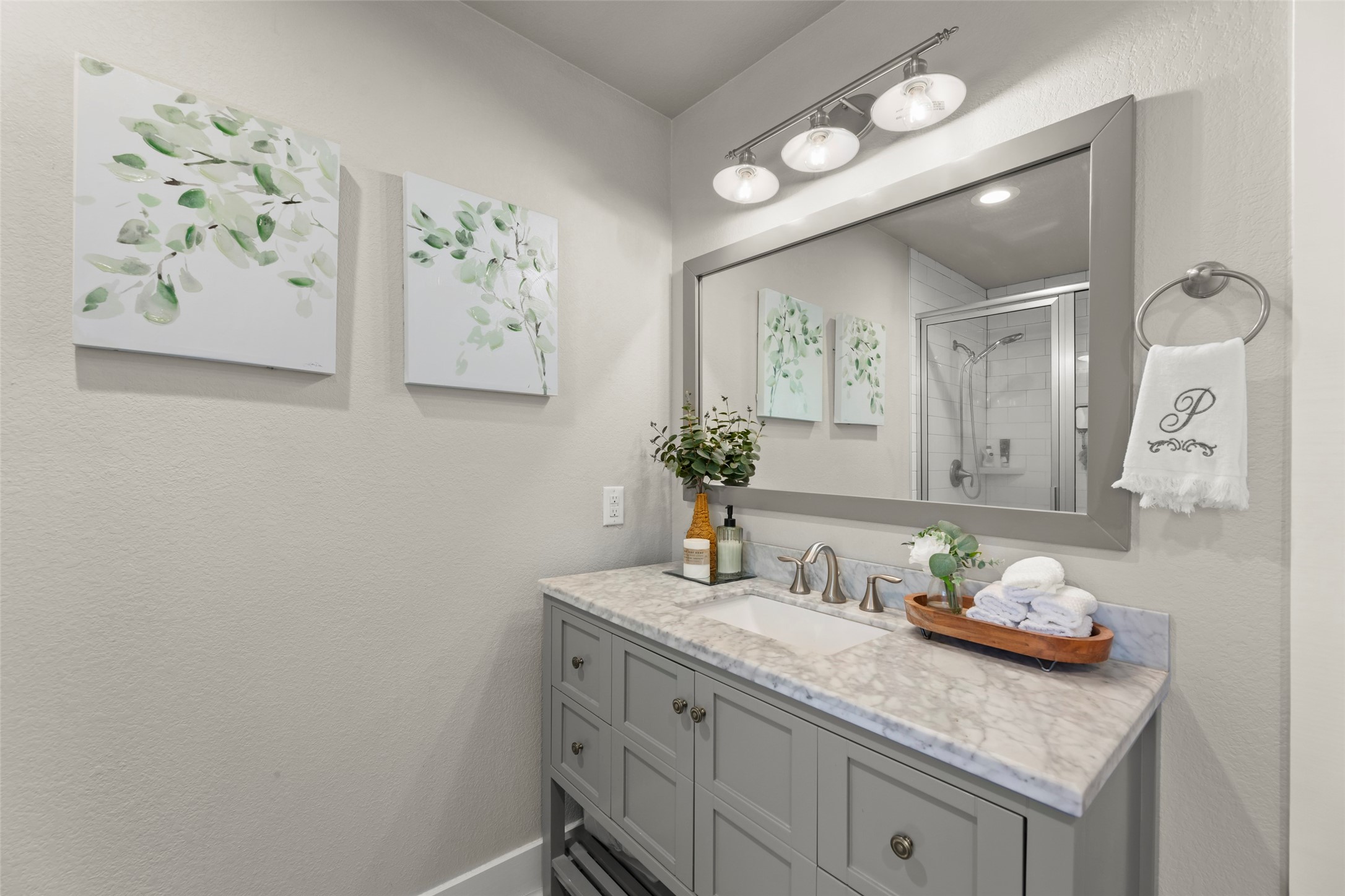 23918 Overcup Drive Spring, TX 77389 - Photo 29 of 37 a bathroom with a granite countertop sink a toilet and a mirror