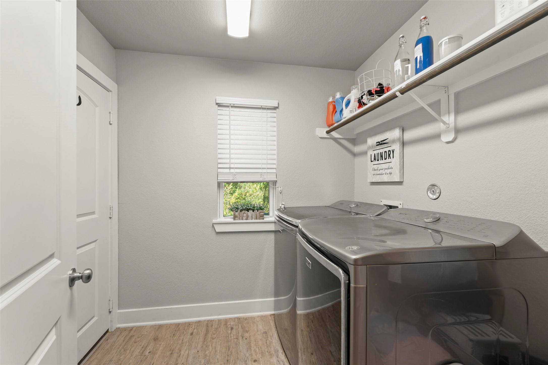 23918 Overcup Drive Spring, TX 77389 - Photo 30 of 37 a utility room with a window dryer and washer