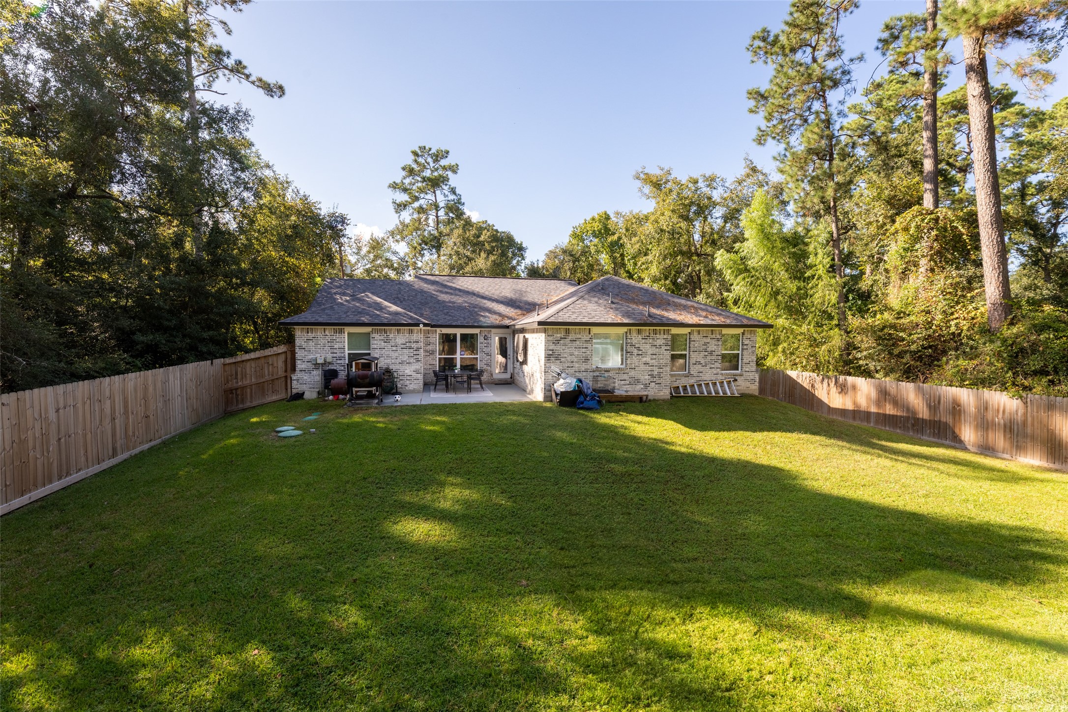 23918 Overcup Drive Spring, TX 77389 - Photo 36 of 37 a front view of house with yard and seating area
