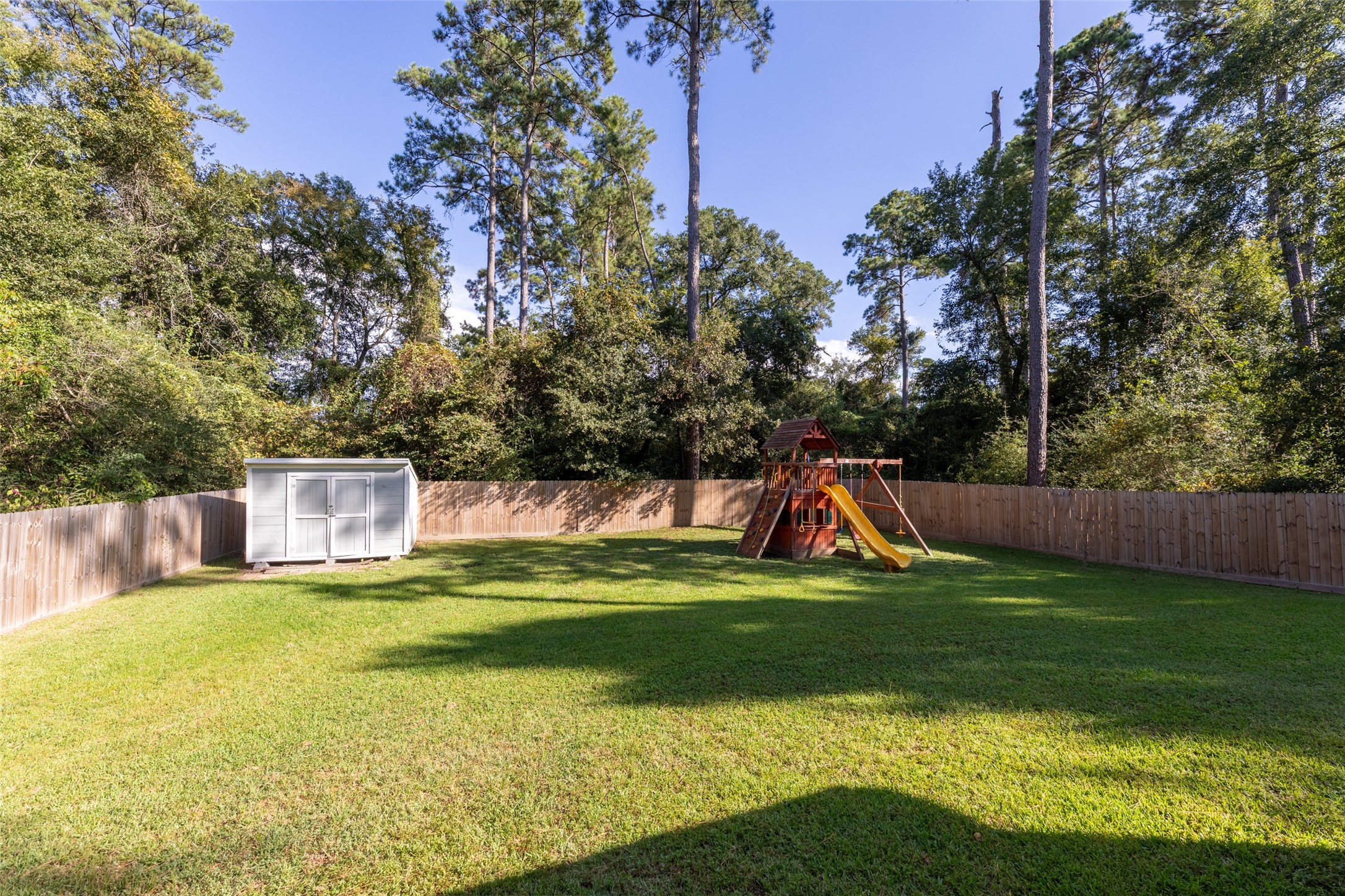 23918 Overcup Drive Spring, TX 77389 - Photo 37 of 37 a view of a swimming pool with a yard
