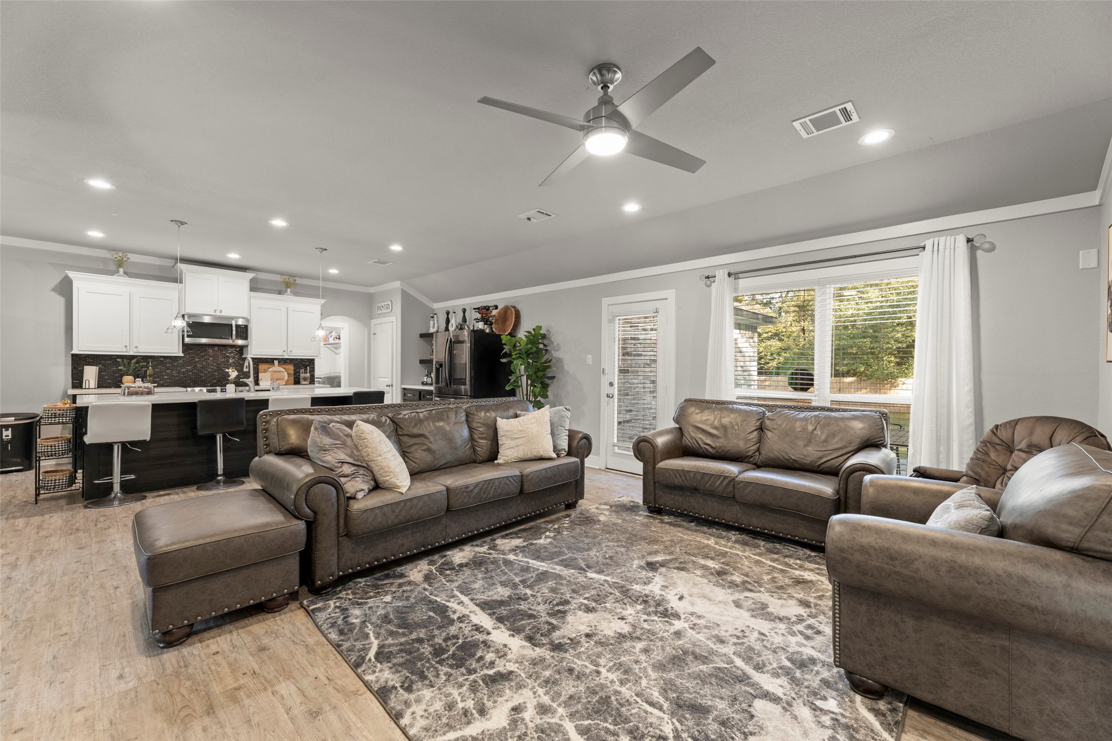 23918 Overcup Drive Spring, TX 77389 - Photo 4 of 37 a living room with furniture and a large window
