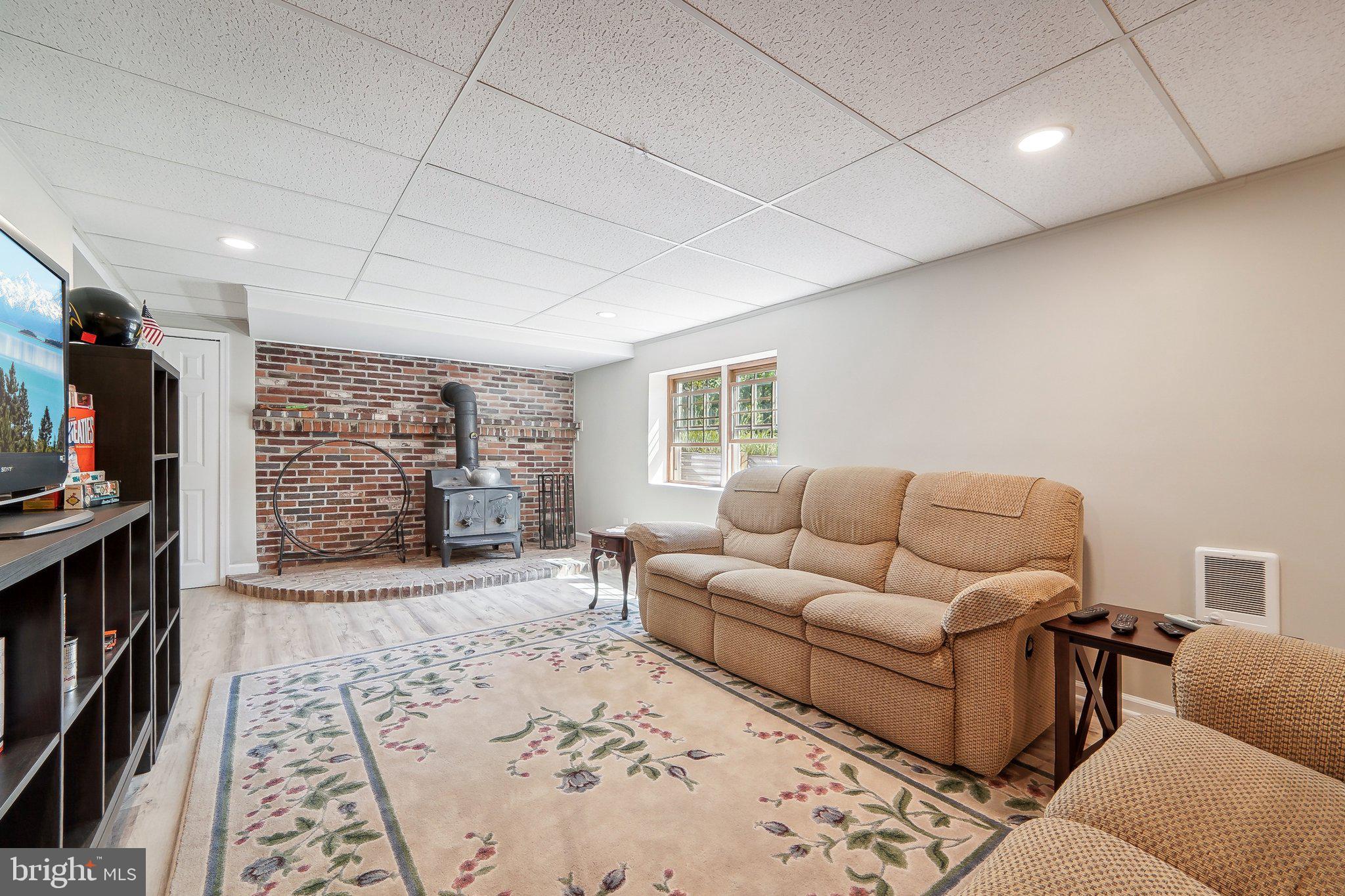 2715 Coon Club Road Westminster, MD 21157 - Photo 32 of 42 Wood stove in the Lower Level