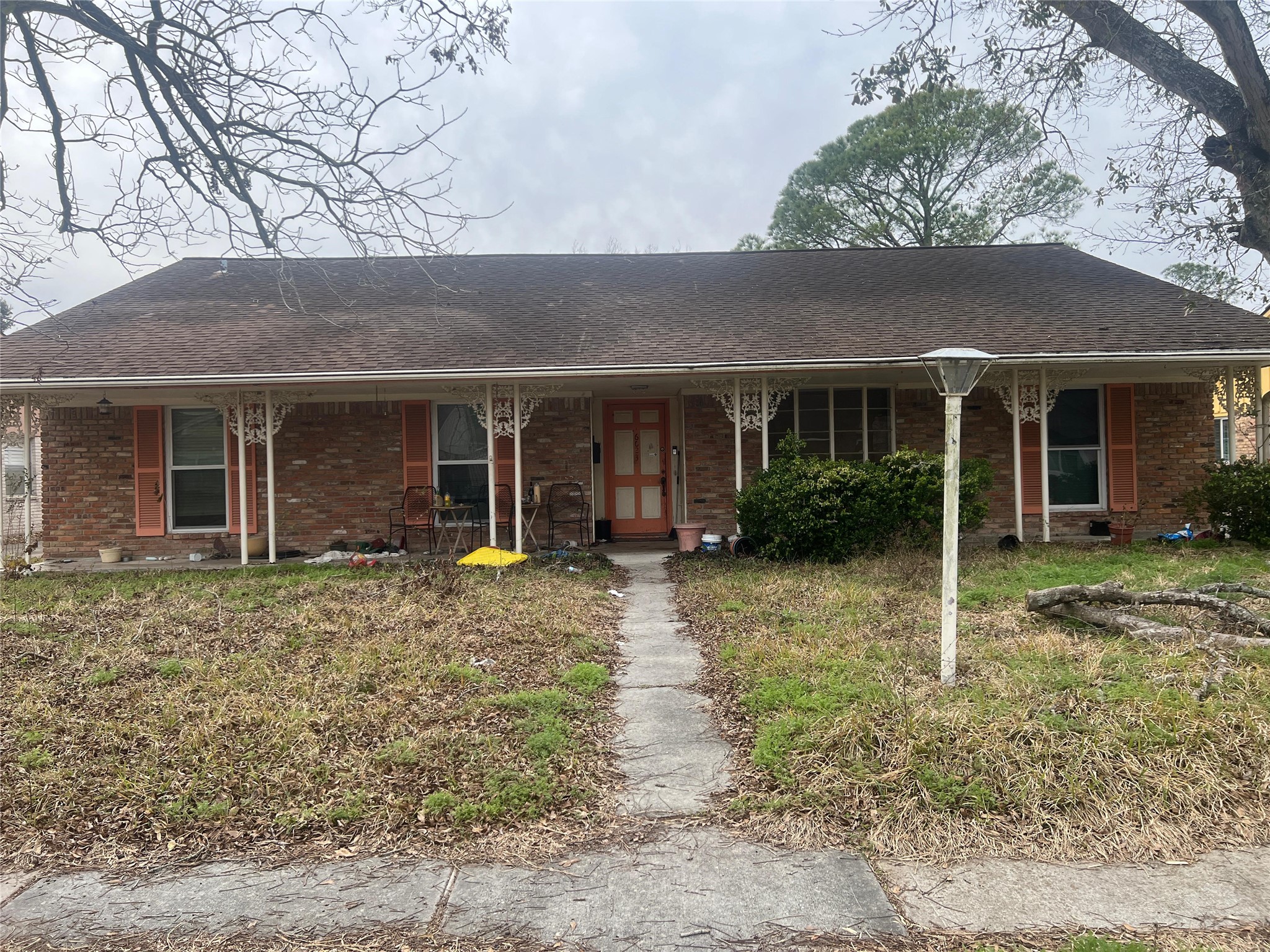 front view of a house with a yard