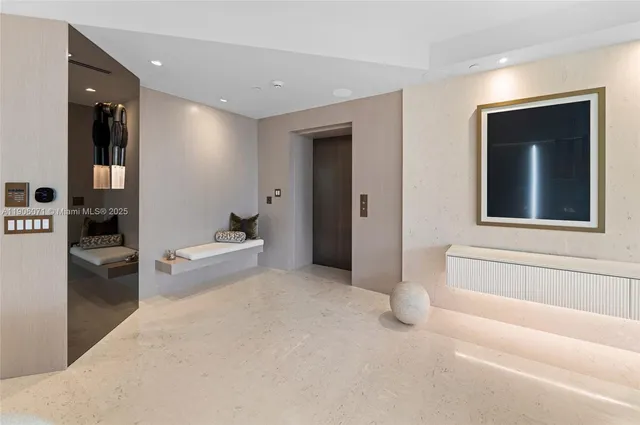 a view of storage and utility room with washer and dryer