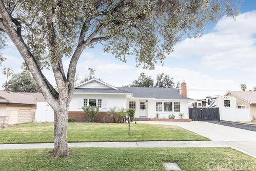 4563 Toyon Road Riverside, CA 92504 - Photo 1 of 1 a front view of a house with a yard