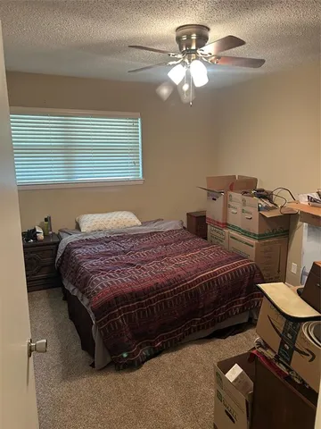 a dining room with furniture window and outside view