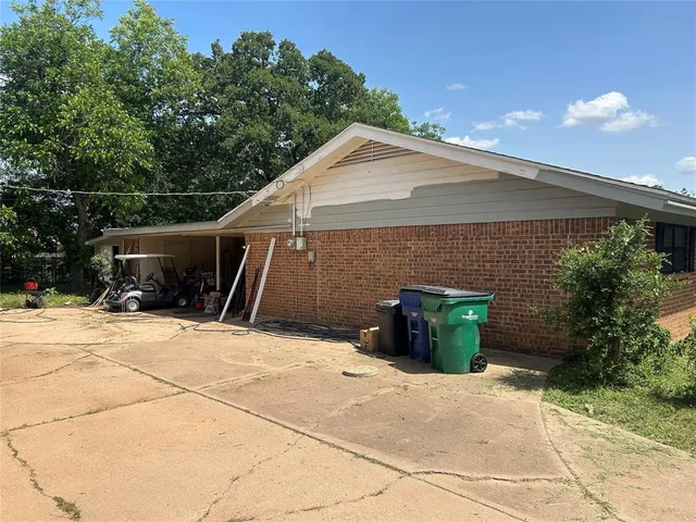 a backyard of a house with seating space