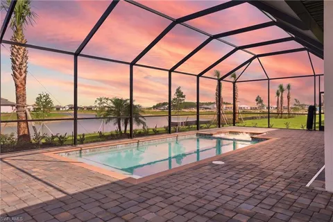 a view of a swimming pool with a porch